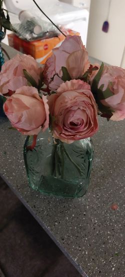 Roses and vase