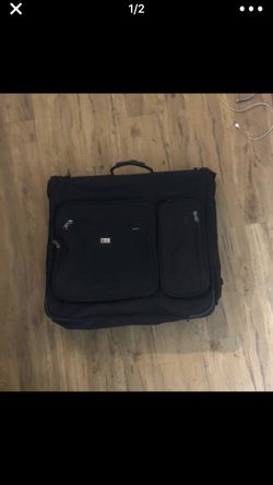 FIRM PRICE TRAVEL HANGING GARMENT BAG/ SUITCASE