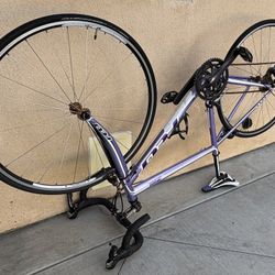 FELT Road Bike. Needs Tune Up. Carbon Fiber Fork. Shimano Breaks. Clip In Pedals.