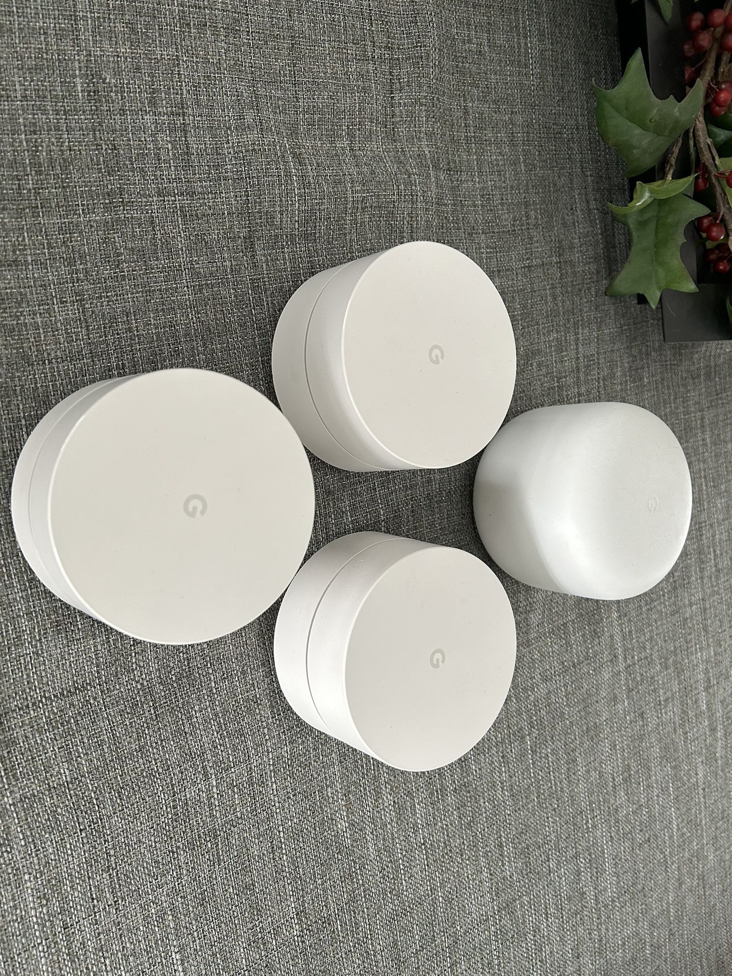 Google Nest router and 3 Google WiFi mesh pucks