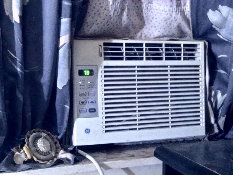 G.E. AIR CONDITIONER AIR COILS AND FILTER CLEANED