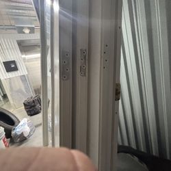 Two Pairs Of  Patio Doors.