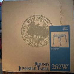 Real wood juvenile round table. Made In USA