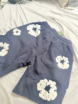 Dark blue denim tears shorts