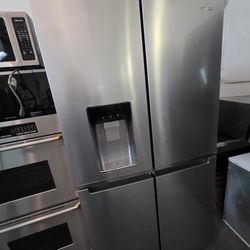 WHIRLPOOL 4 DOOR STAINLESS STEEL REFRIGERATOR