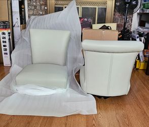 2 NEW Swivel Chairs (NO LEGS)