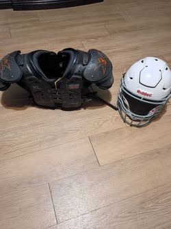 XL Youth shoulder pads and medium helmet