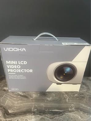 new sealed vidoka Bluetooth mini projector