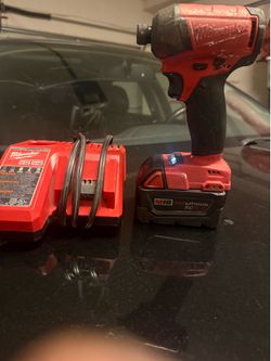 Milwaukee fuel drill , charger , battery
