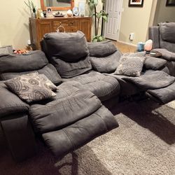 Set: Electric reclining couch and oversized chair set. (Tear on one couch cushion) $500