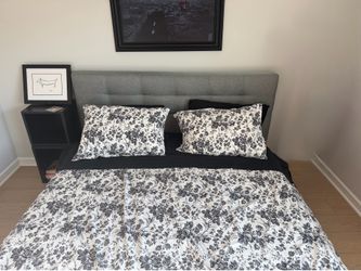 Bed frame with headboard
