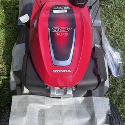 BRAND NEW NEVER HAD AN OIL IN THE ENGINE HONDA HRX -217 WITH BLADE CLUTCH. ALLOWING TO RUN LAWNMOWER WITHOUT SHUTTING IT  DOWN. COMES WITH INSTRUCTION