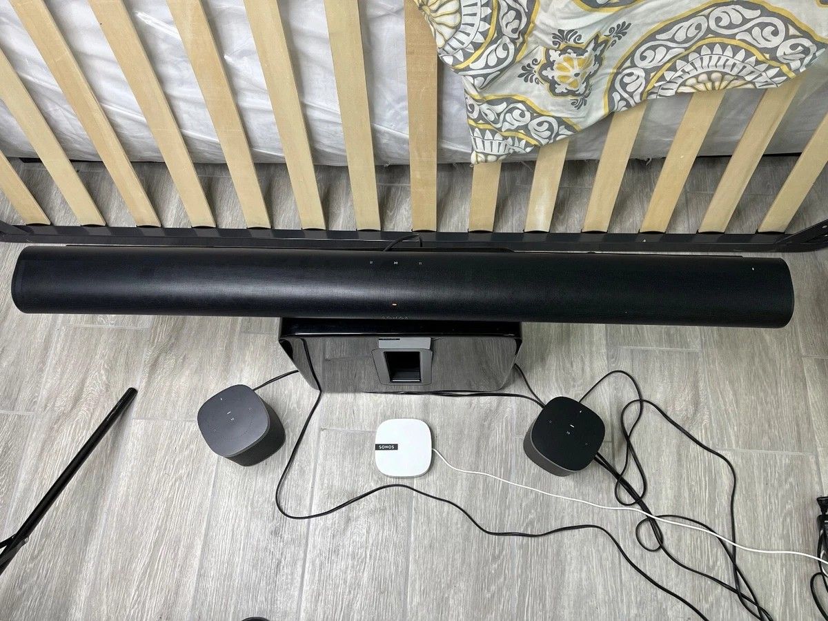 Sonos Arc S19 5.0 Channel Black Smart Soundbar, subwoofer and two rear speakers.