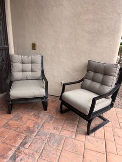Two large patio chairs