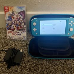 Turquoise Nintendo Switch Lite with Accessories