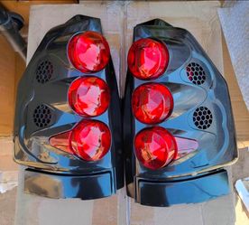 02-09 GMC Envoy Tail Lights Luces Traseras Calaveras Micas Faros Lamps