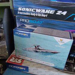 RC mini jet boat brand new in a box ready to run including remote controller battery and a charger
