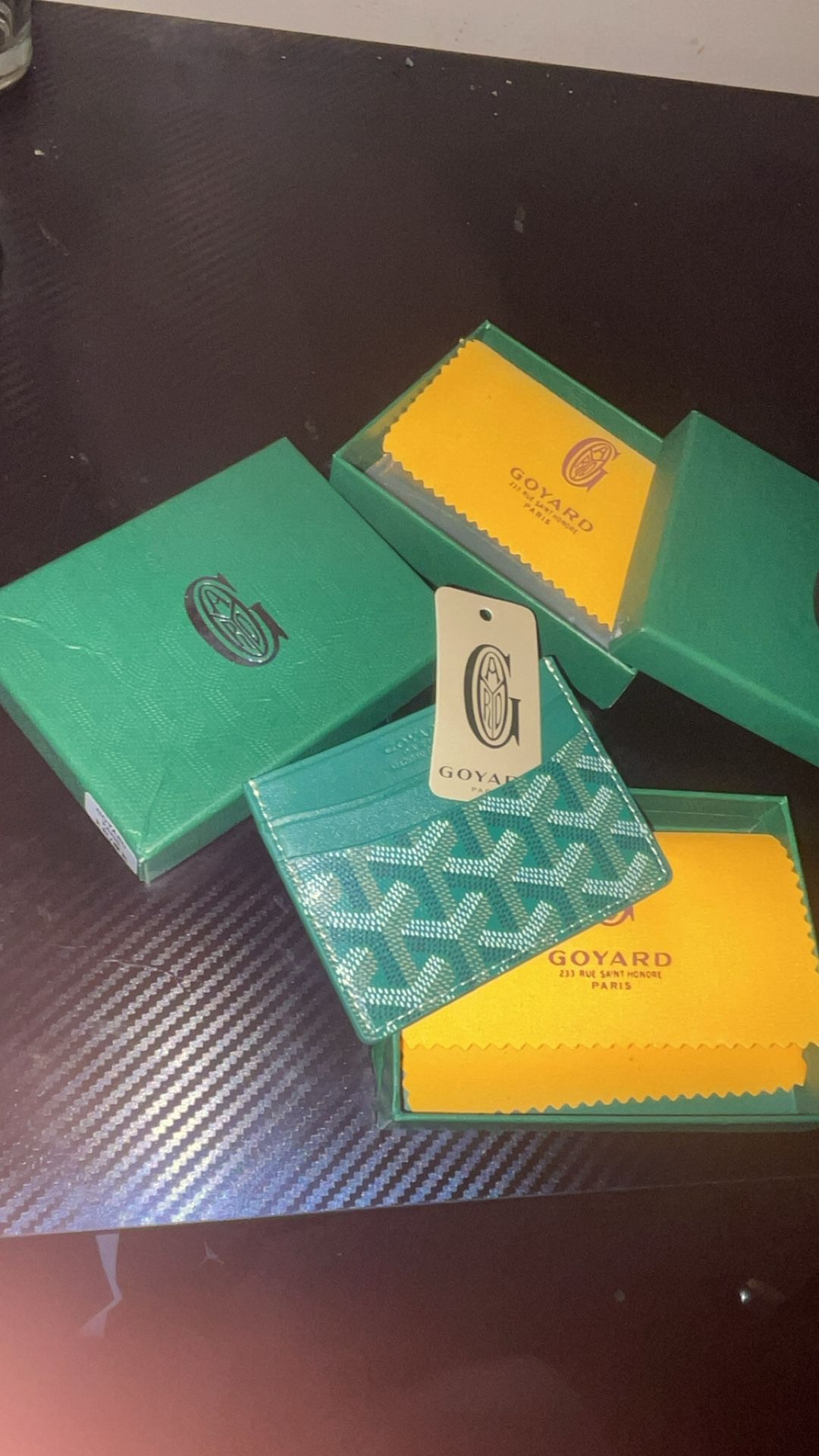 green goyard wallet