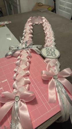 Pink graduation leis