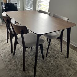 Brown Dining Table With 4 Chairs And Rug