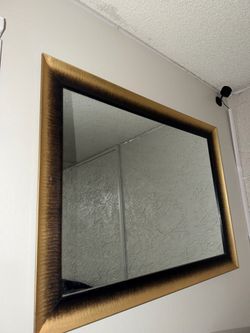 black and gold mirror