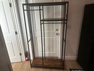 Clothes rack with shelves