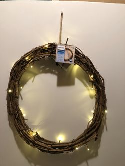Brand new Philips Rattan wreath Battery operated with LED lights.
