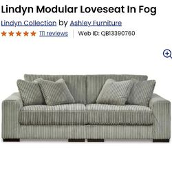 Signature Design by Ashley Lindyn Transitional Gray Swivel Chair And Love Seat