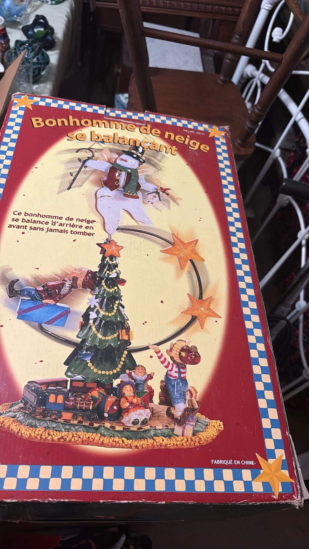 Balancing Snowman Rocks Back-And-Forth With A Wet Counterweight