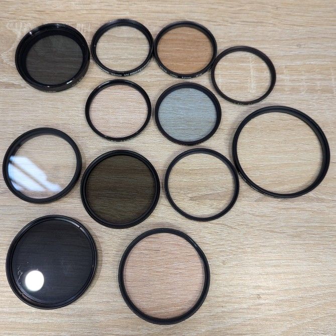 Lot of 12x Camera Lens Filters: Nikon, Platinum, Mercury, Tiffen, Hoya