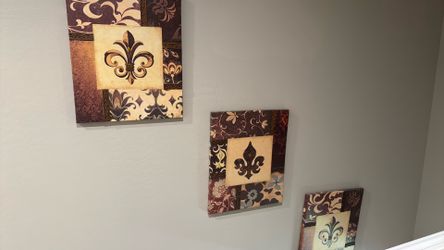Set of three fleur de lis paintings