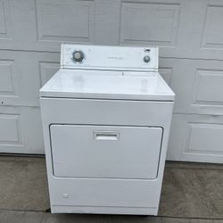 WHITE WHIRLPOOL BIG MOUTH GAS DRYER IN GOOD CONDITION