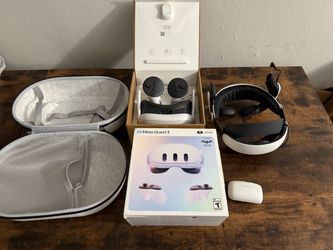 Meta Quest 3 512GB w/ BOBOVR strap, backup battery pack and carrying case.