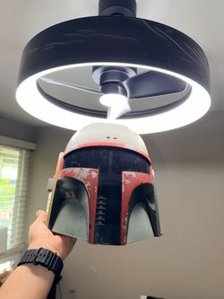 Star Wars Boba Fett helmet, likely a vintage 2009 Hasbro electronic model