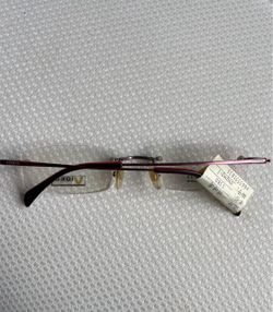 Brand New B-Titanium Rimless Eyeglasses Frame - Purple/Burgundy Brand: VIDEO Material: B-Titanium (Ultra lightweight & durable) Style: Rimles