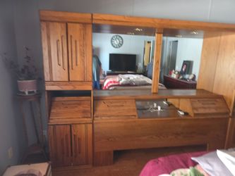 Wall unit with storage for king size.
