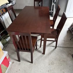 Wooden Dinning Table And Chris 