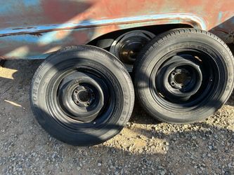215/60R15 Ford rims and tires