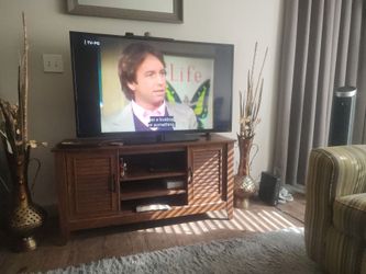 50' Vizio Smart TV and cabinet