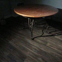 brown round wooden table 