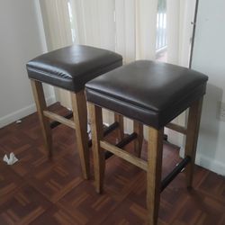 Two Bar Stools Black Leather And Light Wood