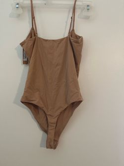 Skims body suit