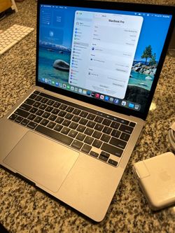 2022 MacBook Pro 13-inch M2 Chip touchbar 256gb ssd 8gb ram macOS Tahoe Works Great. Comes with charger