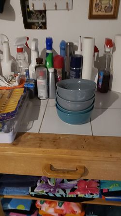 Four blue bowls