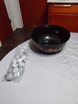 Halloween Trick or Treat Candy Bowl with plastic skulls