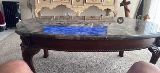 2 marble top tables
