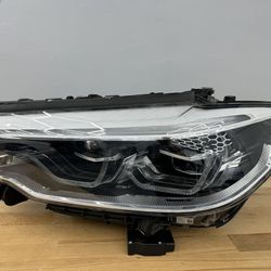 BMW M5 drivers side left headlight adaptive LED 