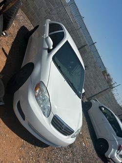 Toyota Corolla White Sedan