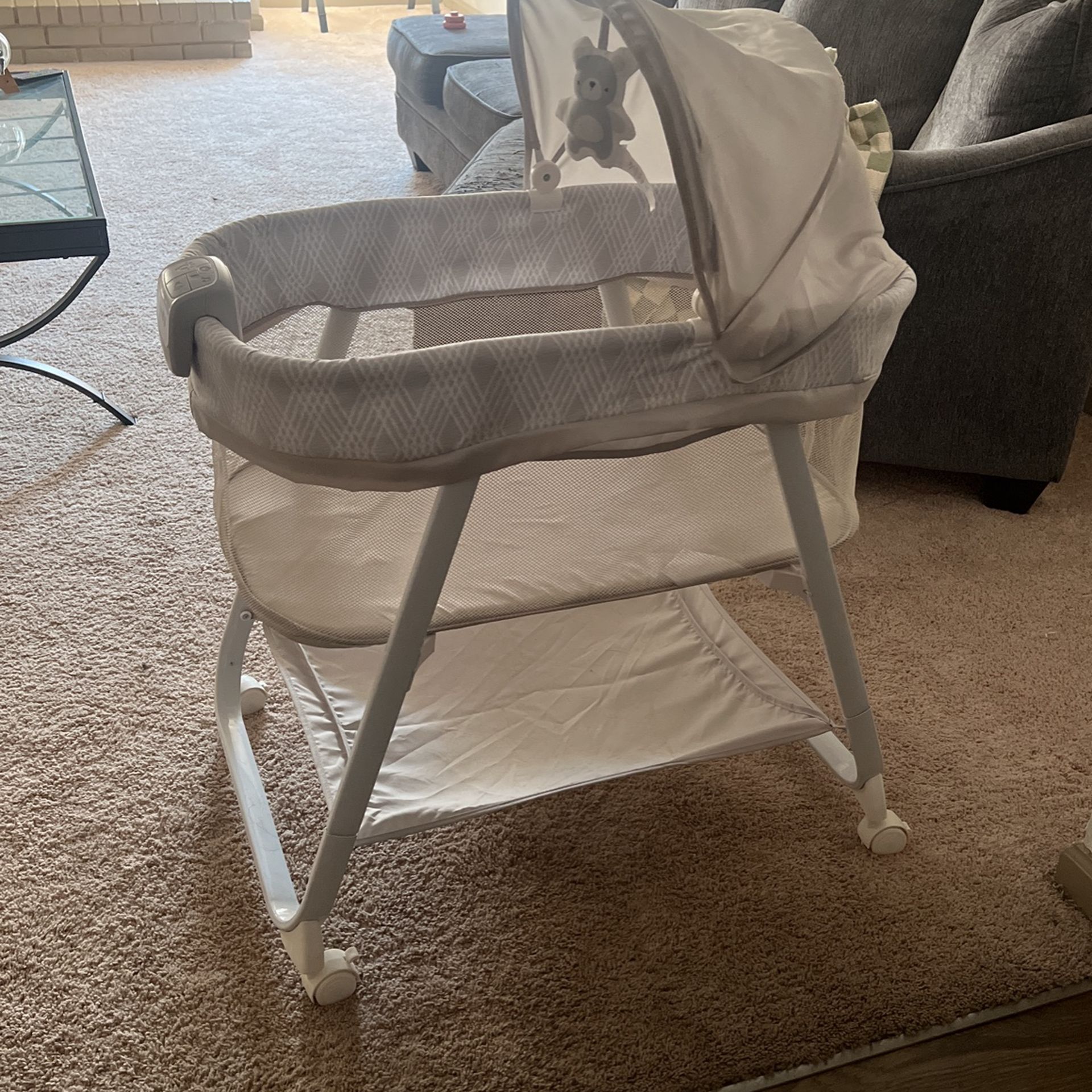 Baby Bassinet Rolling With Sound Machine Attached