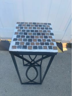 Metal planter with tile design